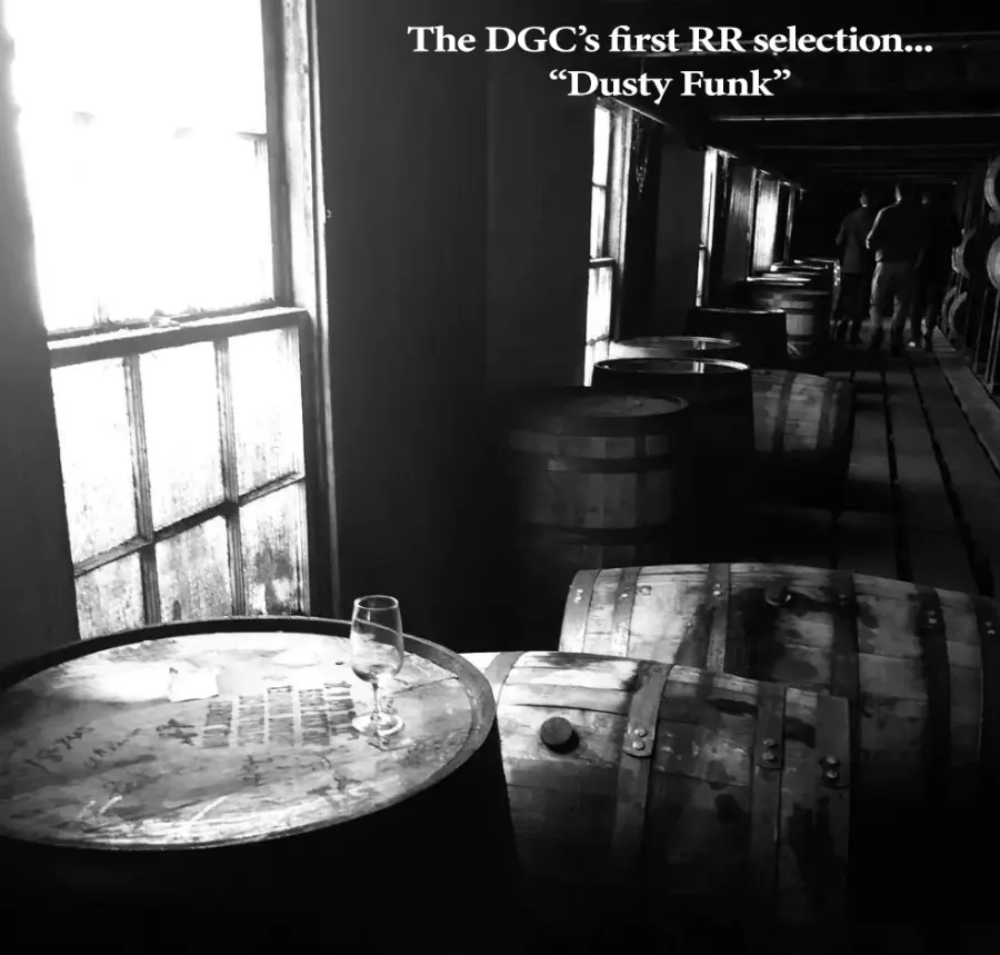 A rickhouse aisle in black and white — the DGC's first Russell's Reserve barrel selection, 'Dusty Funk'